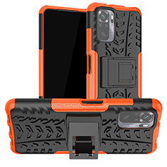 Silikon Hülle Handyhülle und Kunststoff Schutzhülle Hartschalen Tasche mit Ständer JX1 für Xiaomi Poco M5S Orange