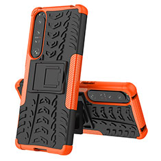 Silikon Hülle Handyhülle und Kunststoff Schutzhülle Hartschalen Tasche mit Ständer JX2 für Sony Xperia 1 IV Orange